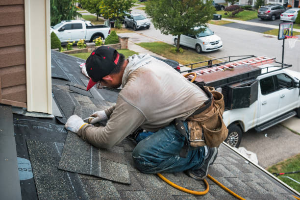 Professional Flat Roof Repair technician working in Belmont, OH